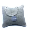 Bracciale Elastico con Targhetta Tonda "Sisters"