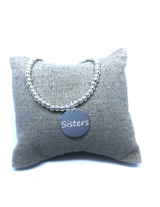 Bracciale Elastico con Targhetta Tonda "Sisters"